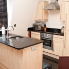 140 Minories Serviced Apartment - Kitchen with all equipments ready for guest stay