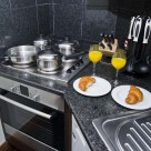 Sanctum Serviced Deluxe 1 Bedroom Apartments - Kitchen