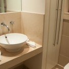 Discovery Dock East Serviced Apartment - Plush bathroom