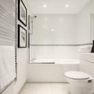 Mosaic Slough Apartment - plush bathroom