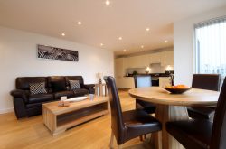 Lexington Apartments in Slough - comfortable lounge with dining area
