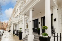 LAK Apartments - White stucco exterior